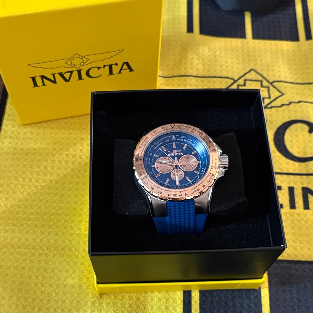 Invicta Men's Watch with Blue Dial and rose gold bezel.